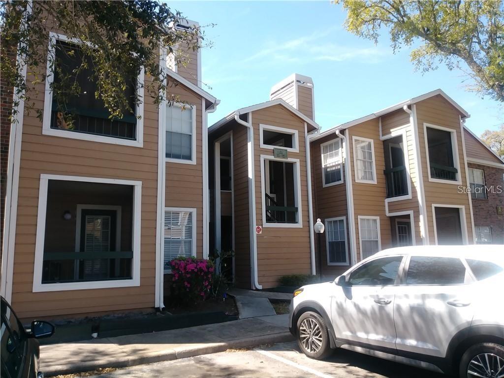 a front view of a house with parking