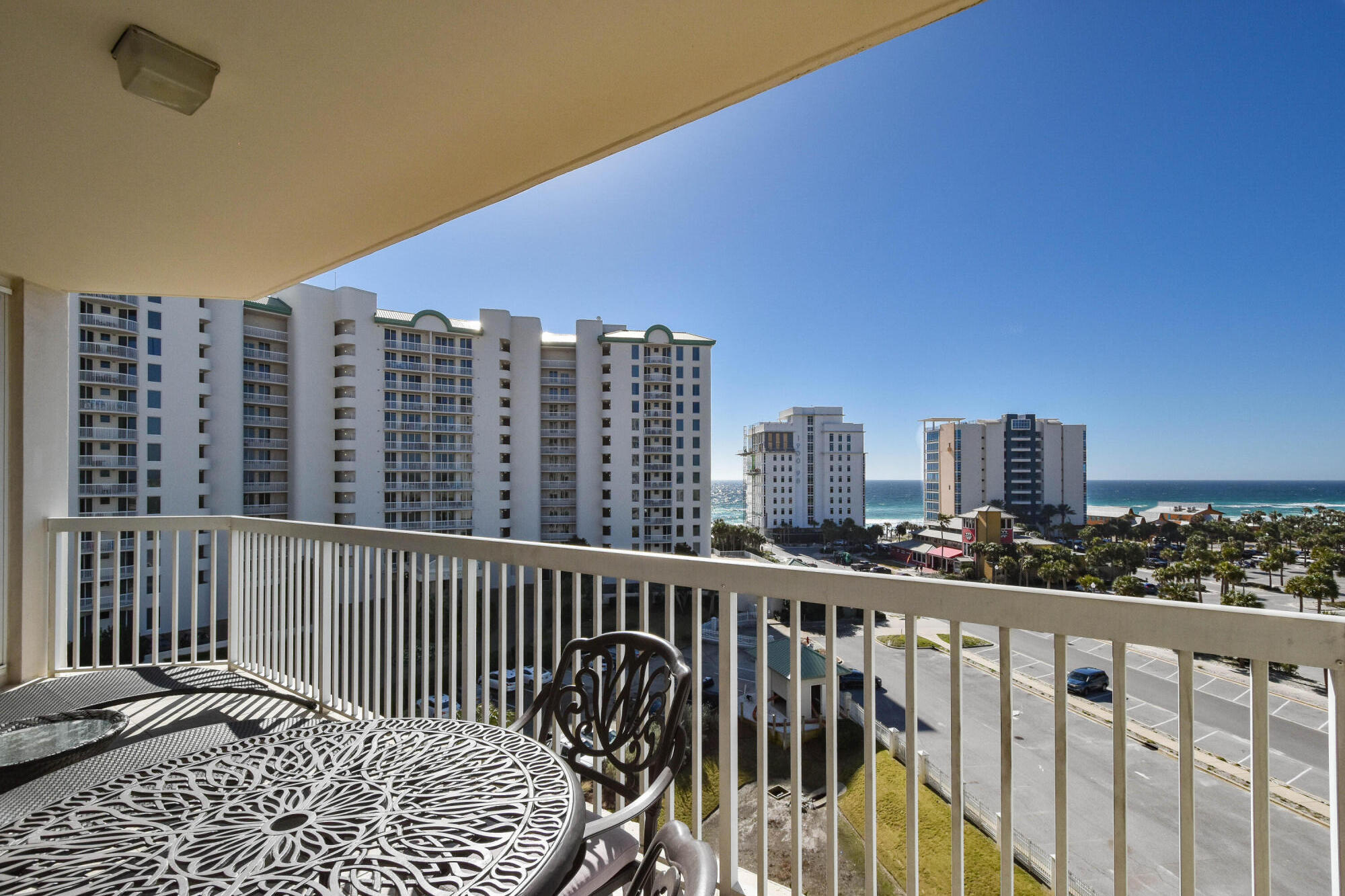 a view of a balcony with city