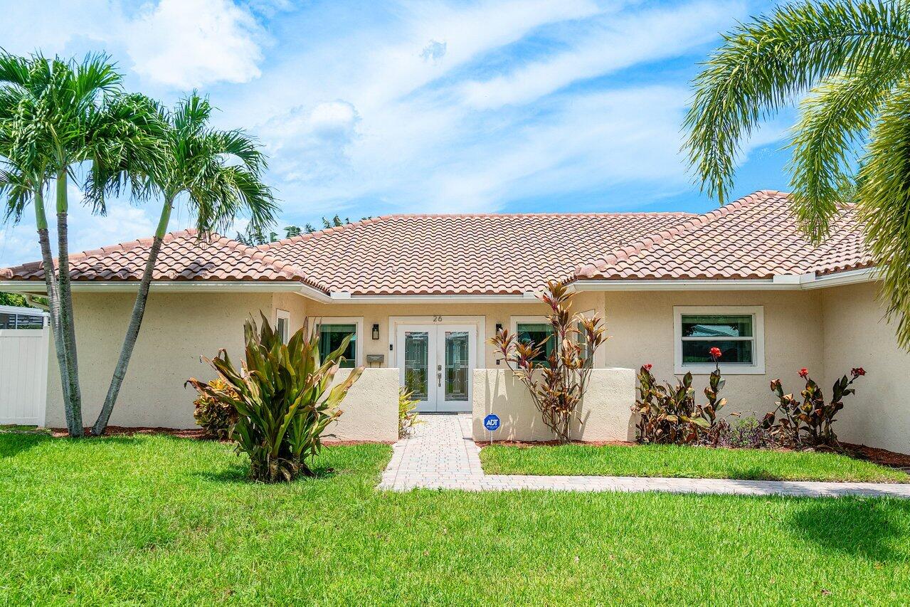 a view of a house with a patio