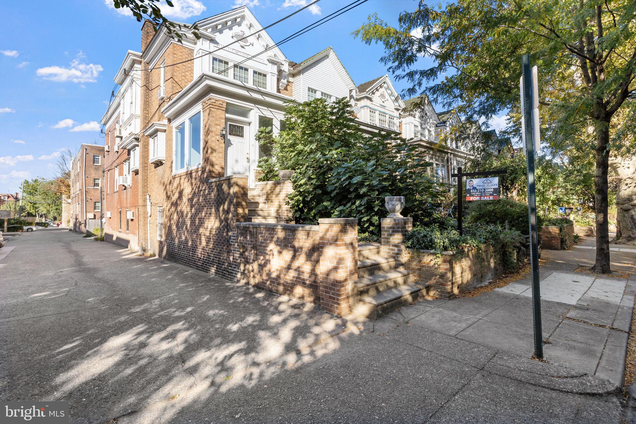 a view of a building with a yard