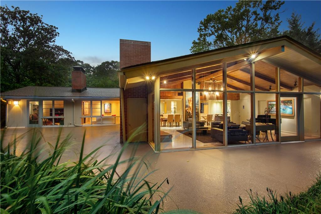 an outdoor space with patio lots of furniture and garden