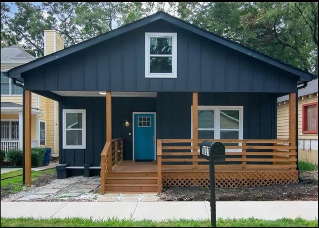 a front view of a house with stairs