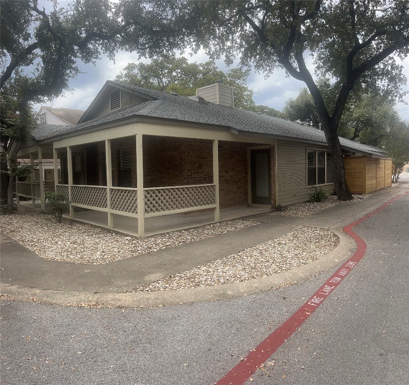 a view of a house with a yard and garage