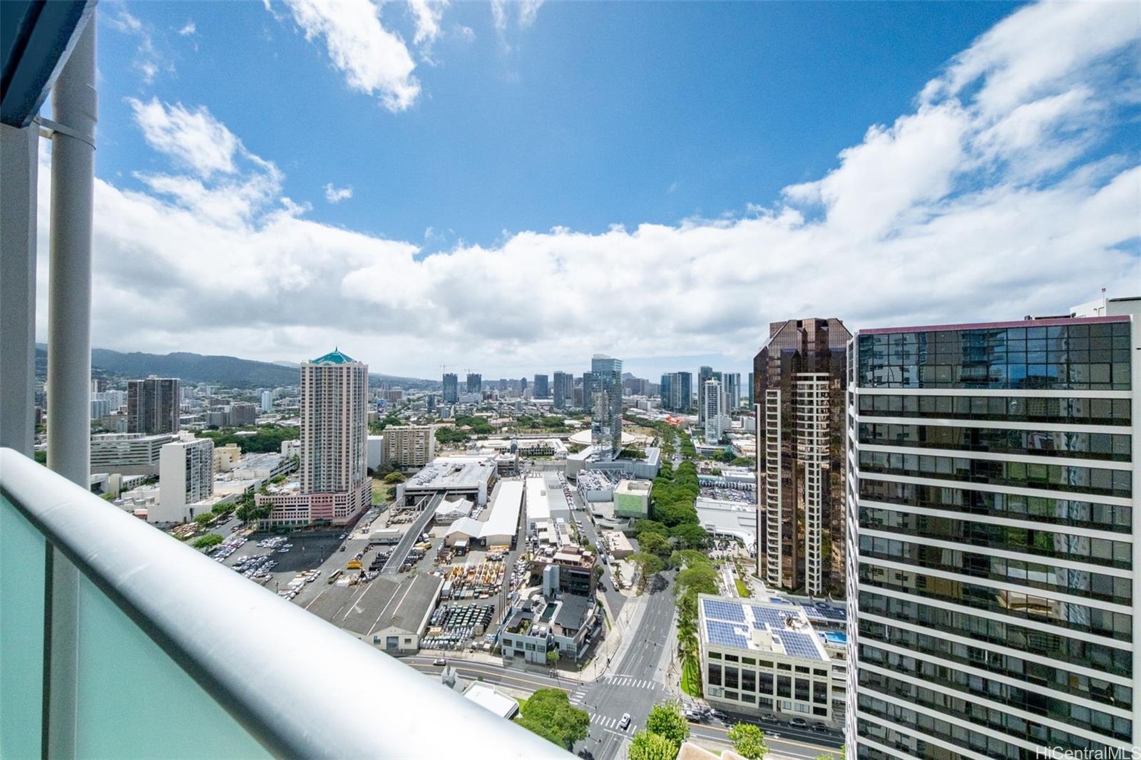 a view of a city with tall buildings