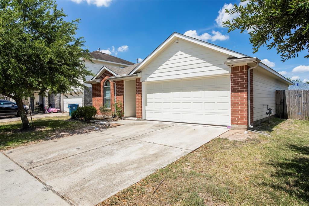 a front view of house with garage