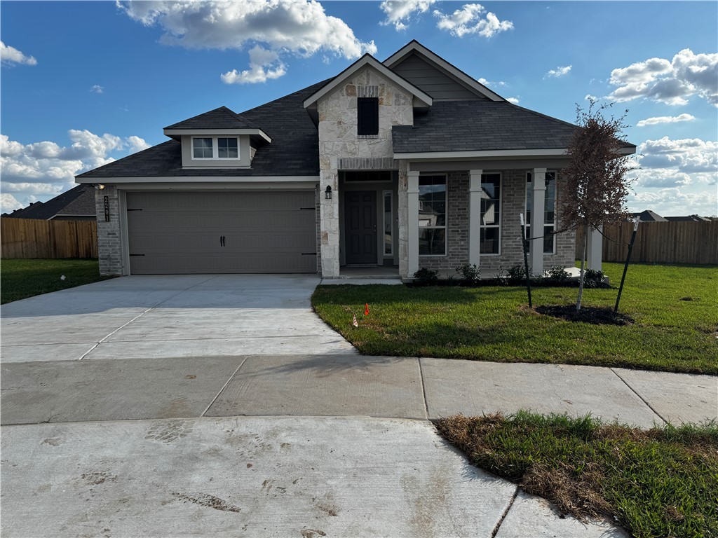 View of front of house featuring a front yard and