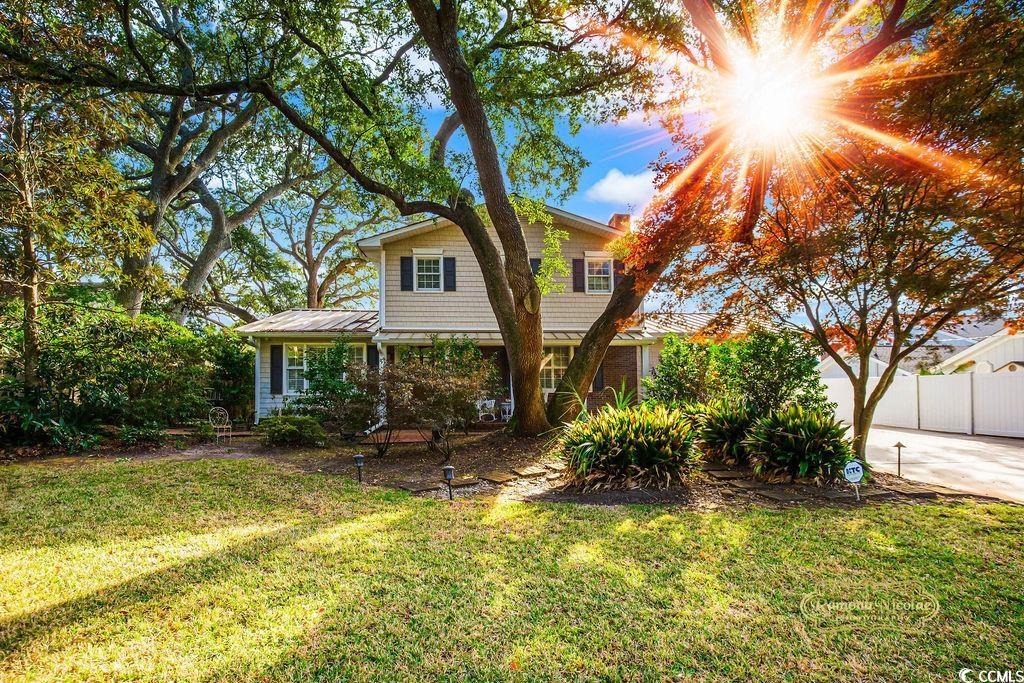 View of front of home with a front lawn