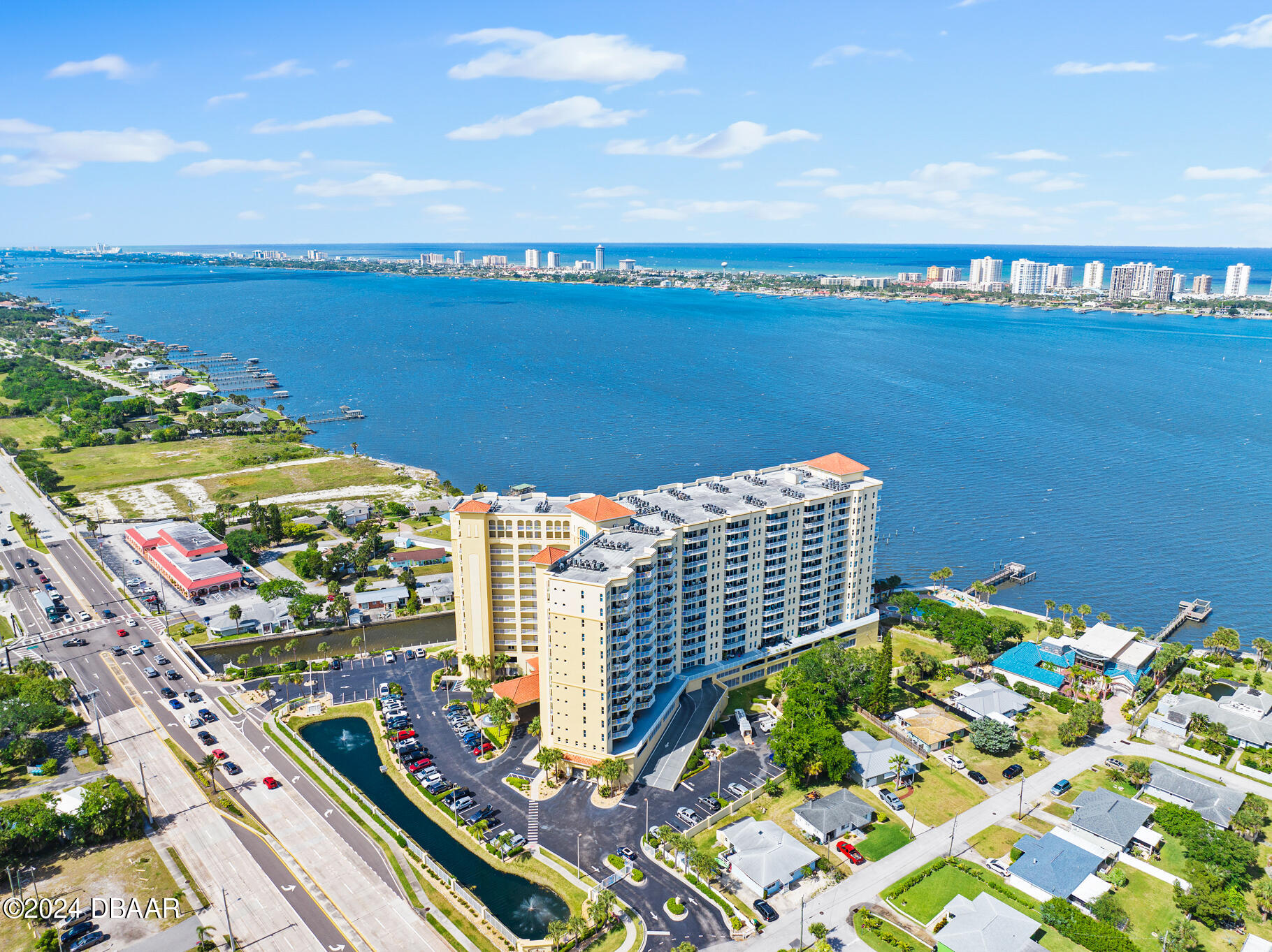 a view of a city with an ocean view