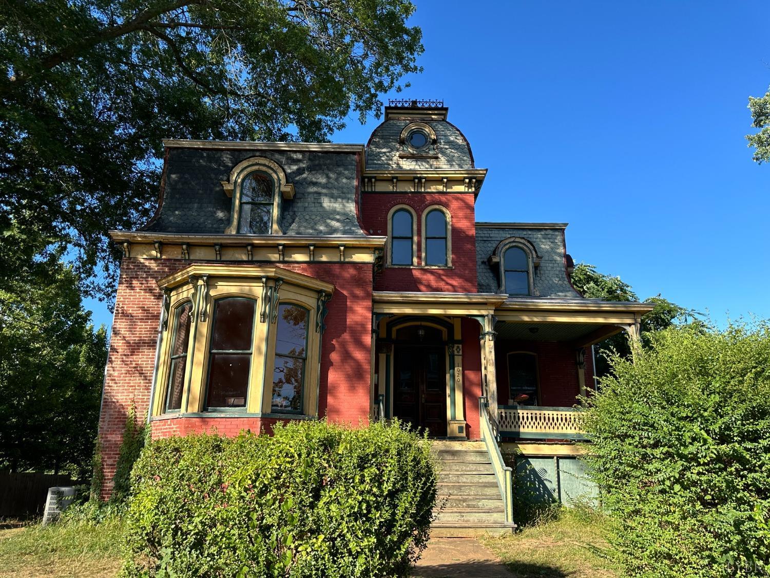 front view of a house with a small yard