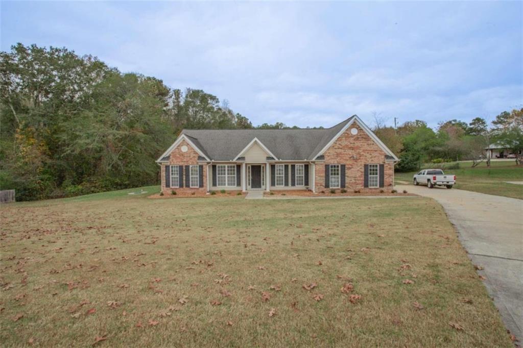 a view of house with outdoor space