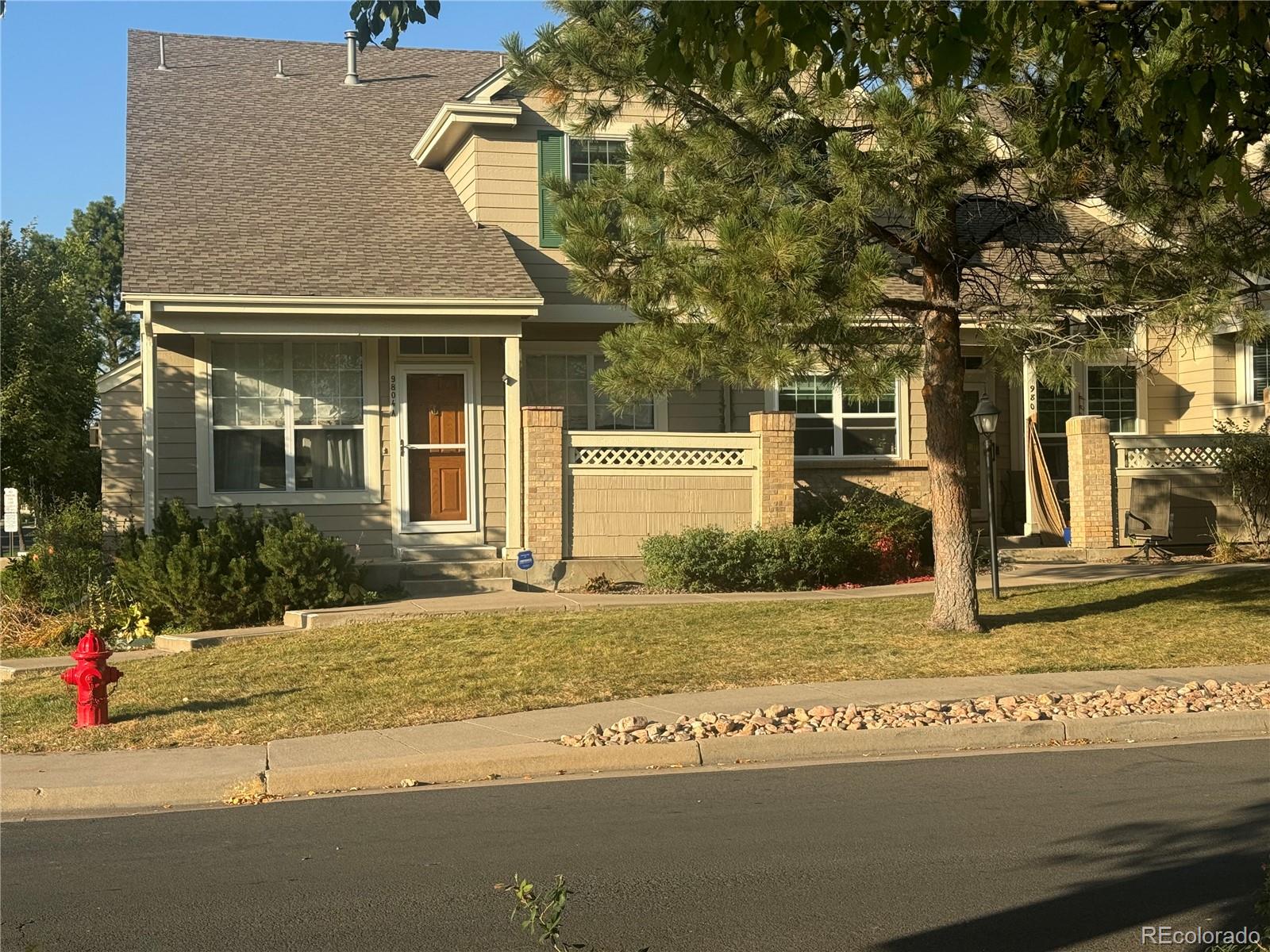 front view of house with a yard