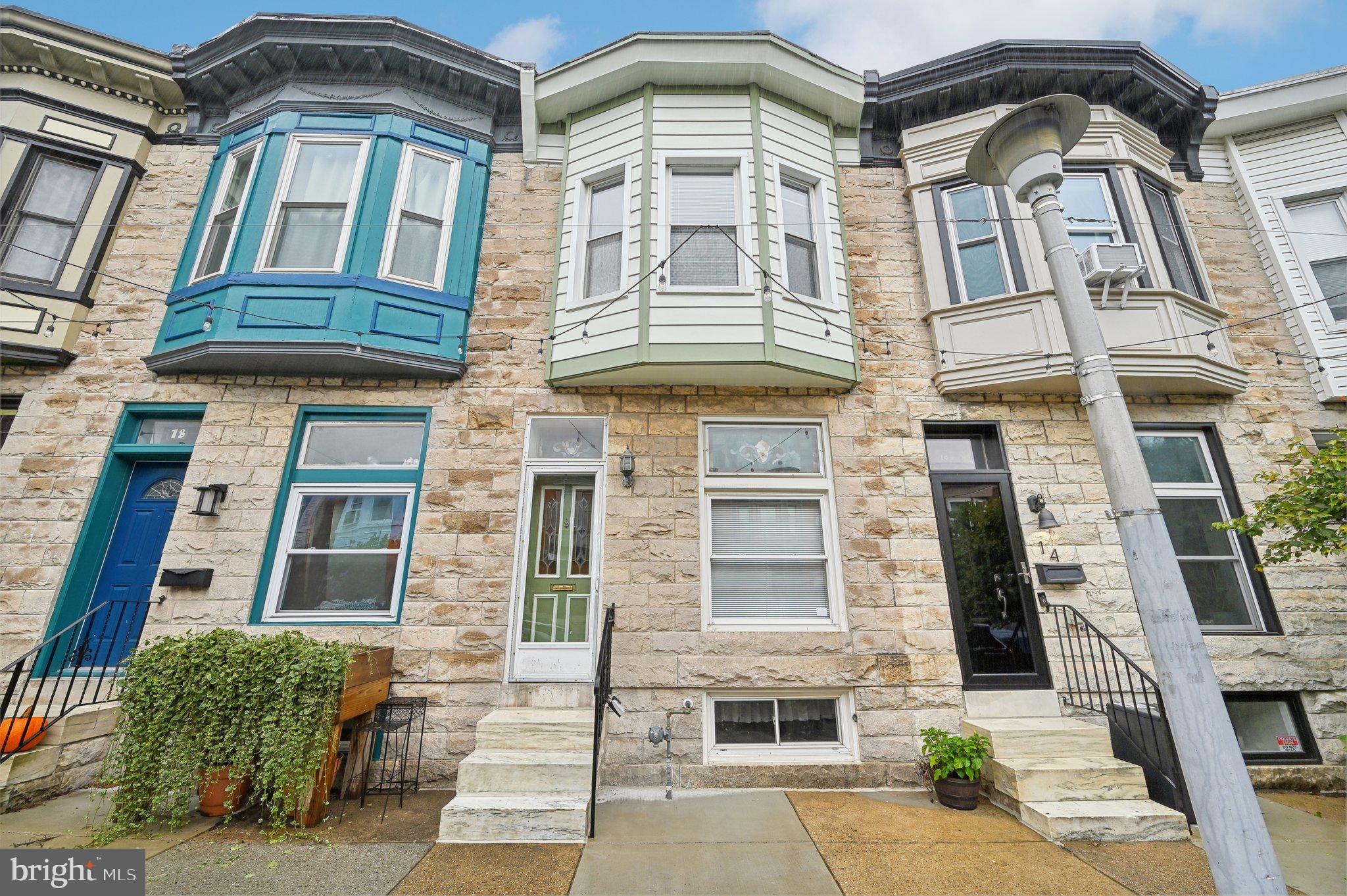 a front view of a multi story residential apartment building