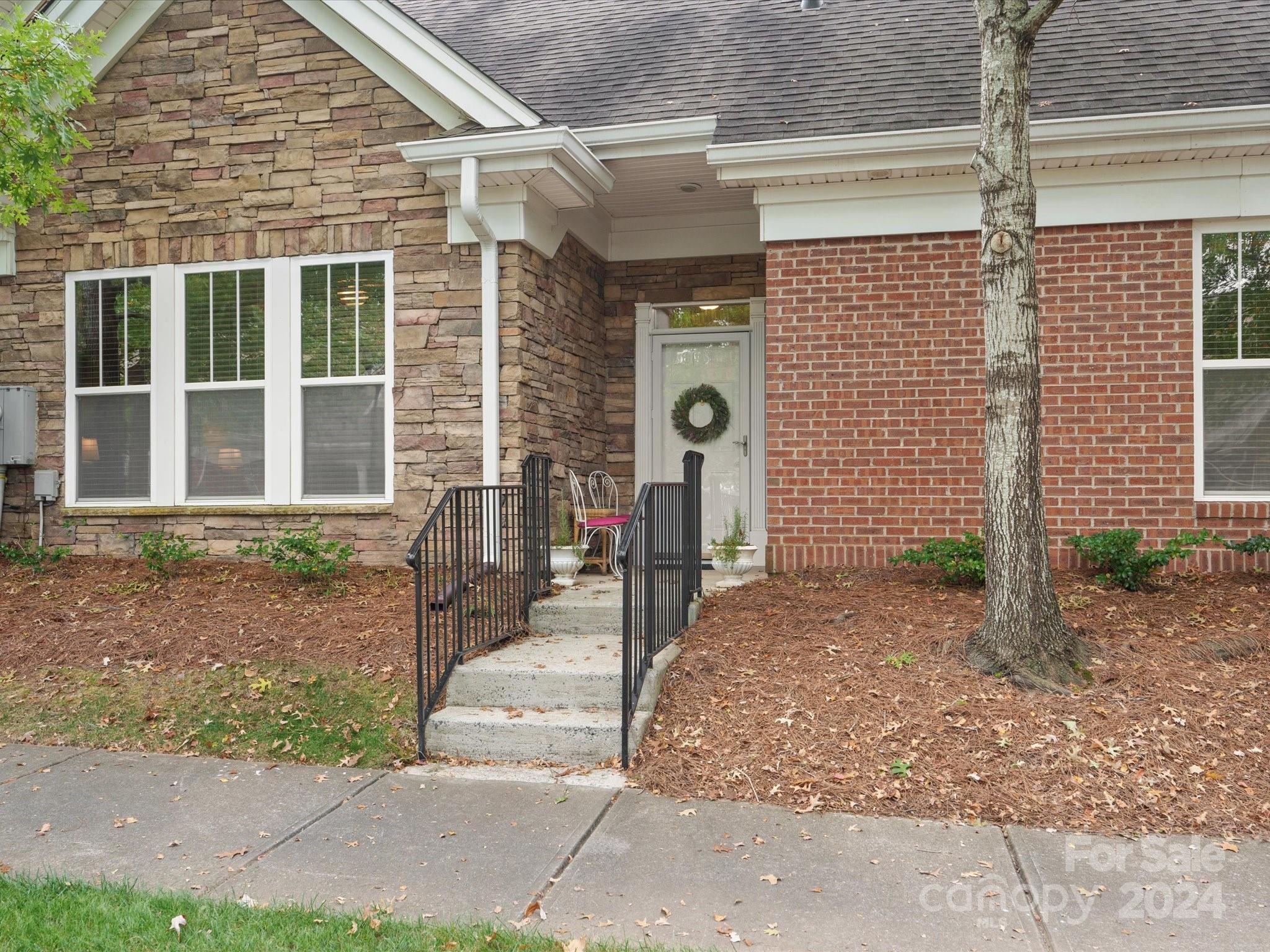 a front view of a house with a porch