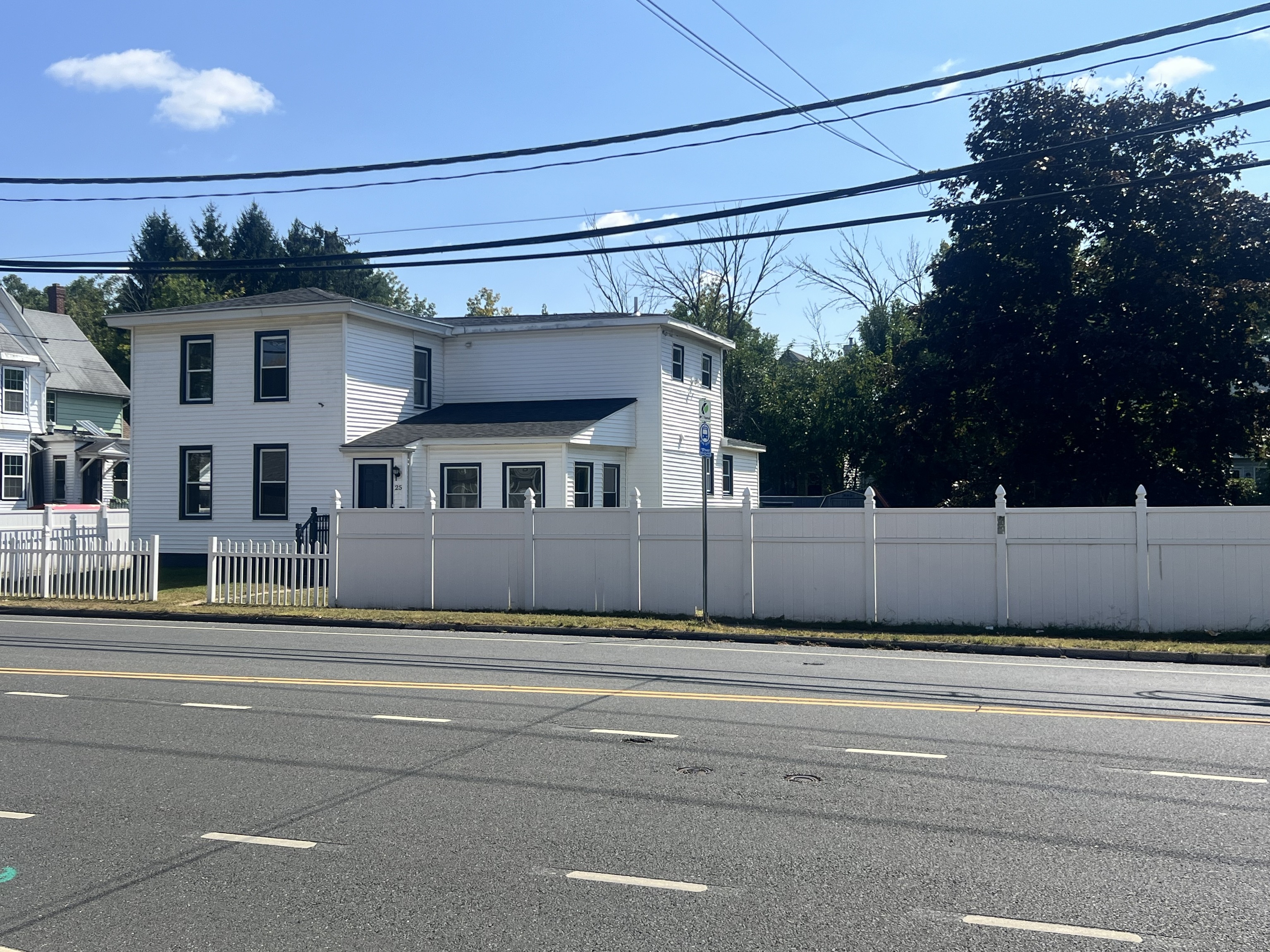 a view of a house with a street