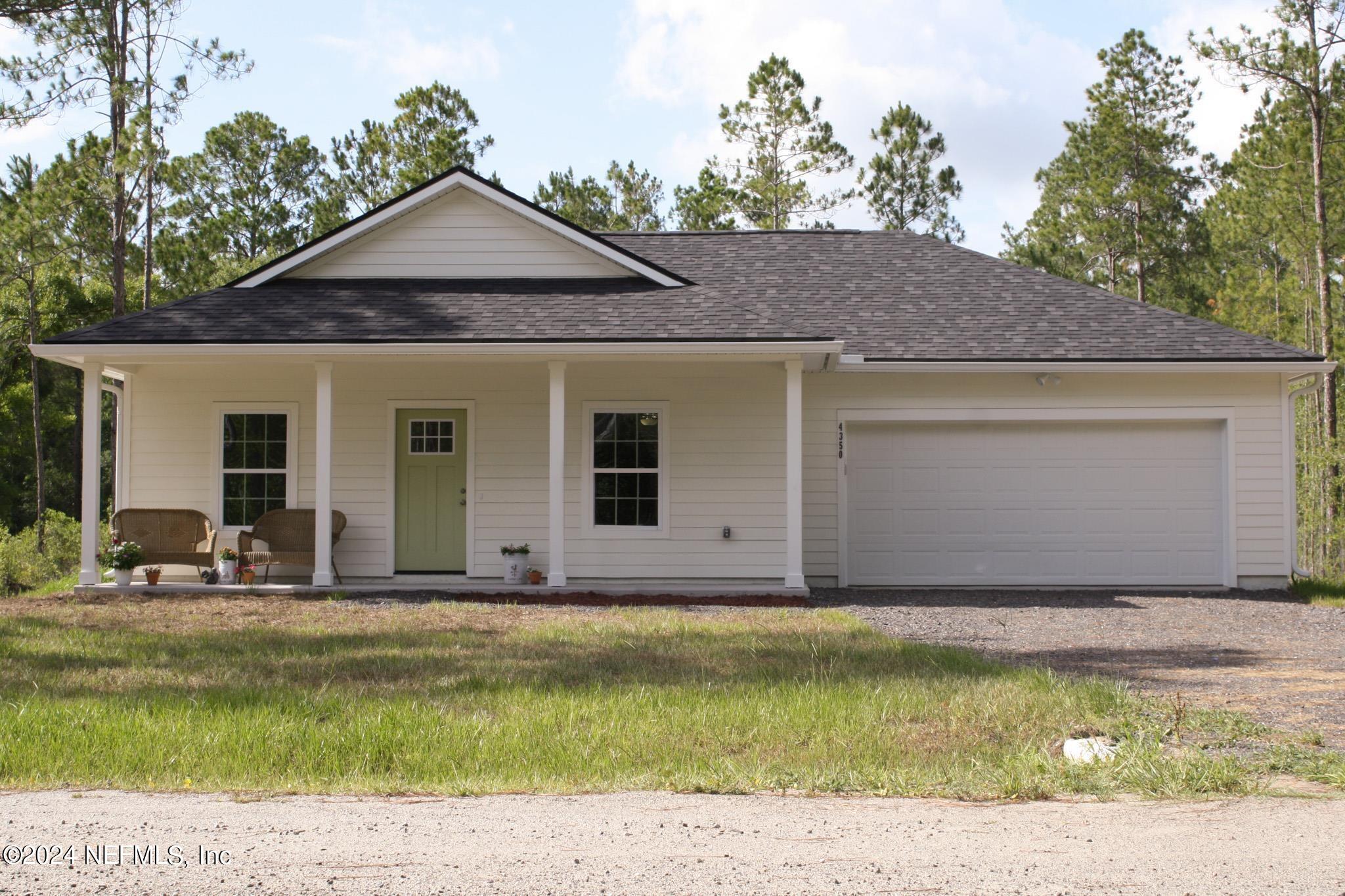 a front view of house with yard