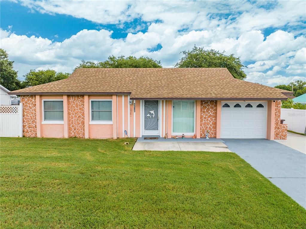 front view of a house with a yard