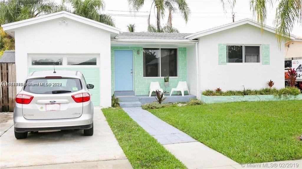 a front view of house with yard