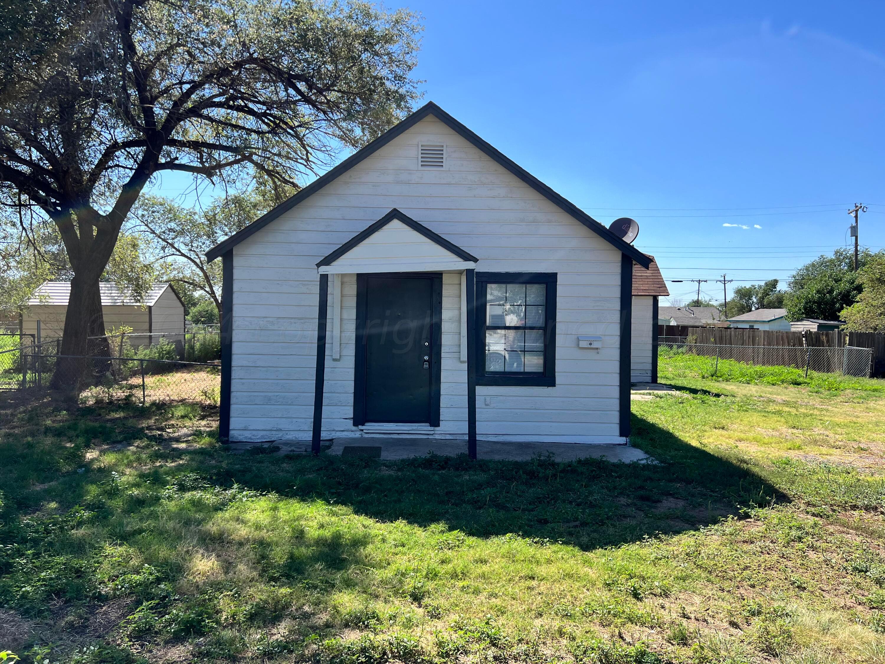 a front view of house with yard