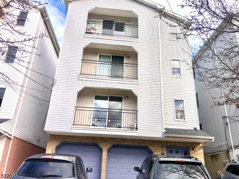 a front view of a house with a balcony