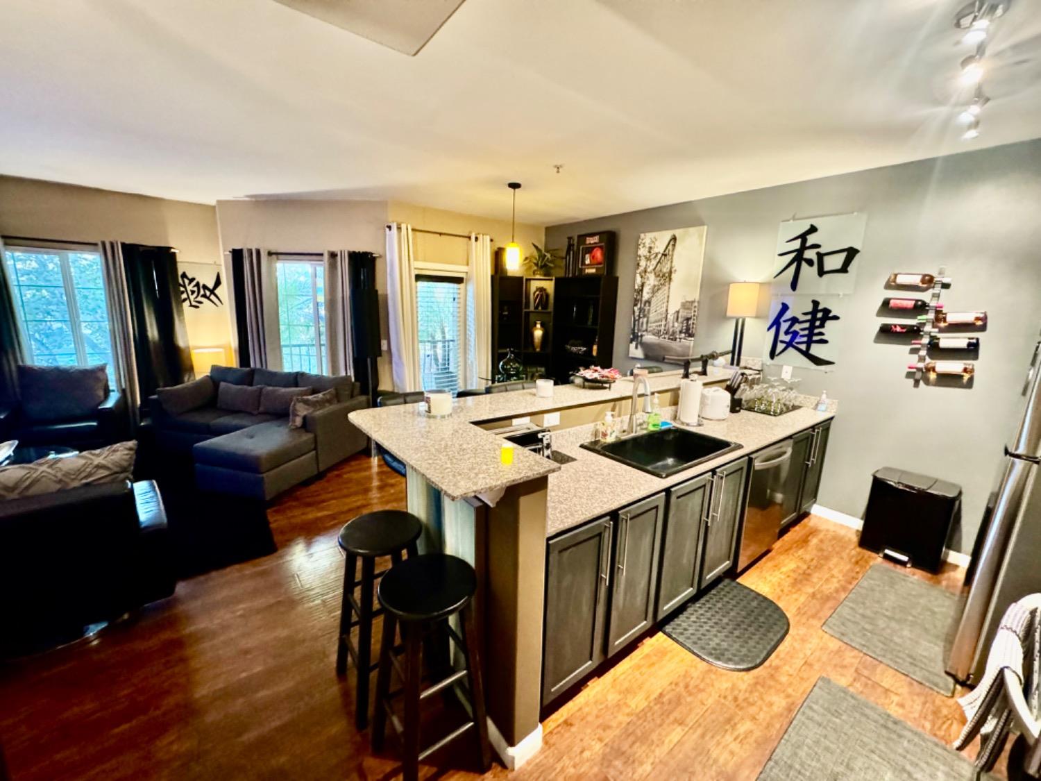 a view of a living room and dining room