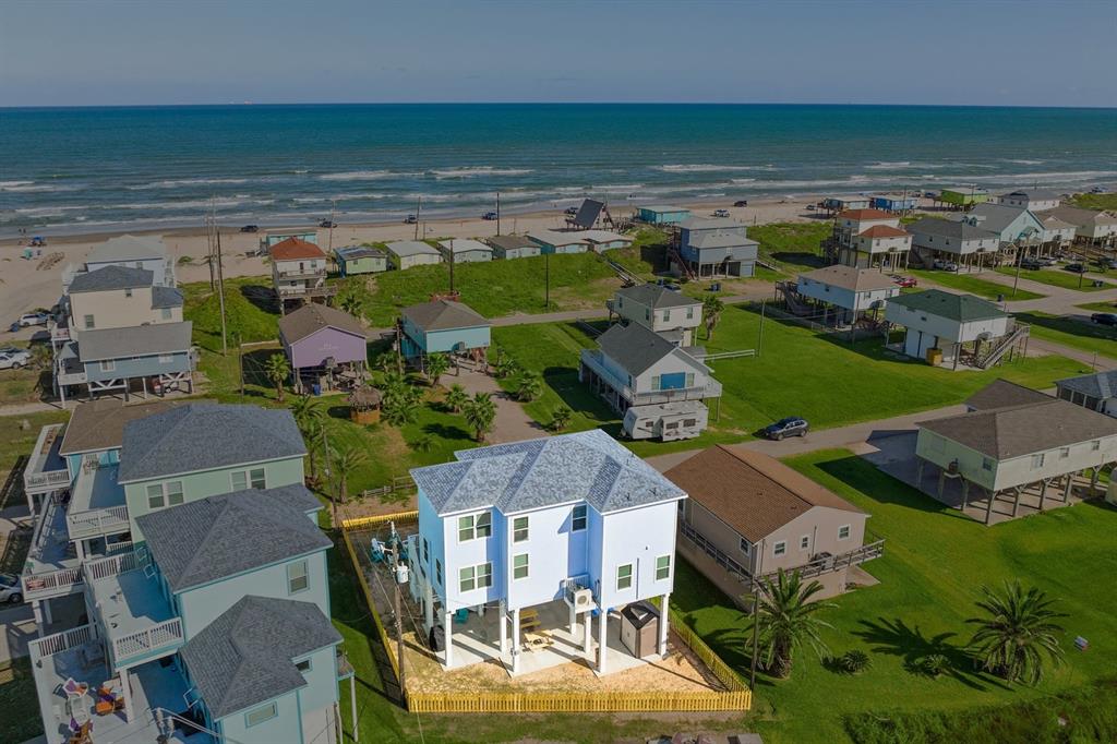 an aerial view of a house with outdoor space