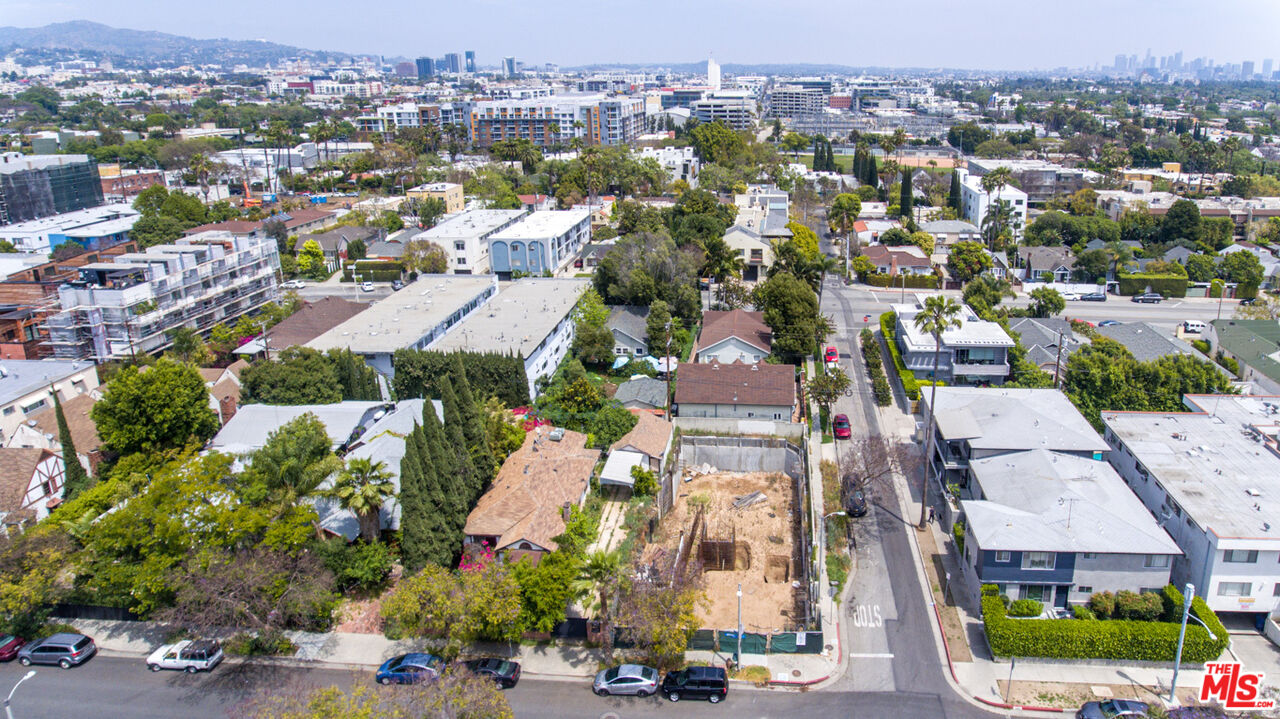 an aerial view of a city with lots of residential buildings