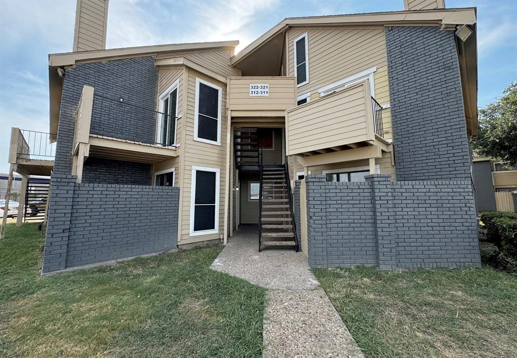 a front view of a house with a garage