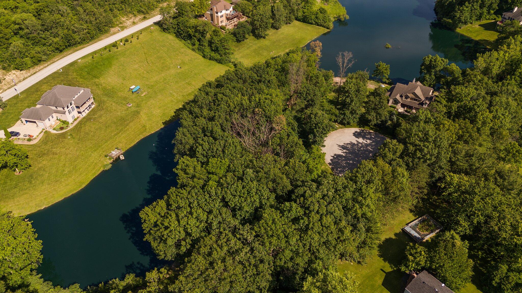 a view of a lake with a building in the background