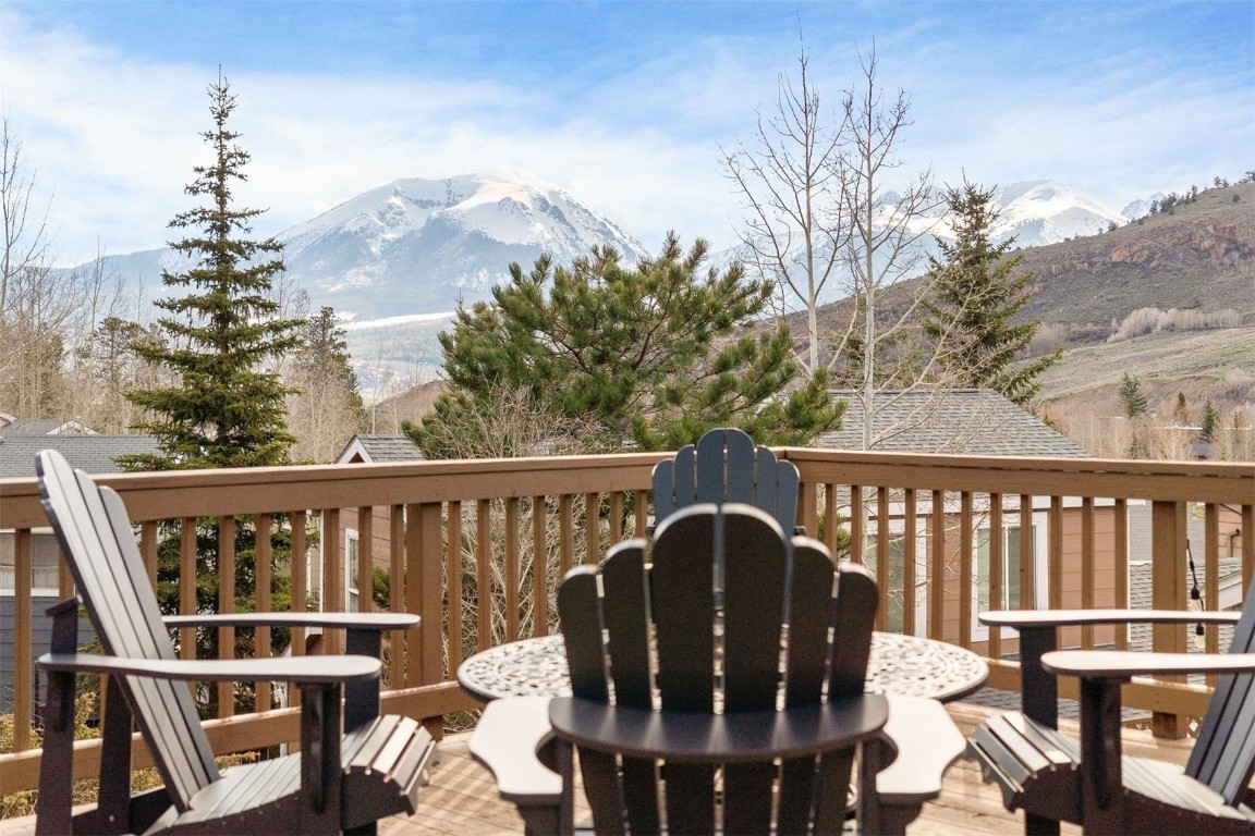 a view of a balcony with chairs