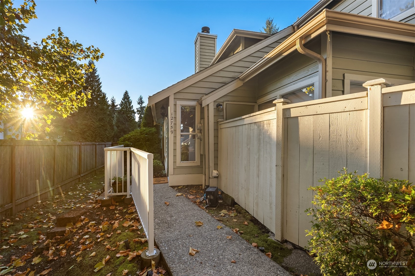 a view of a back yard of the house