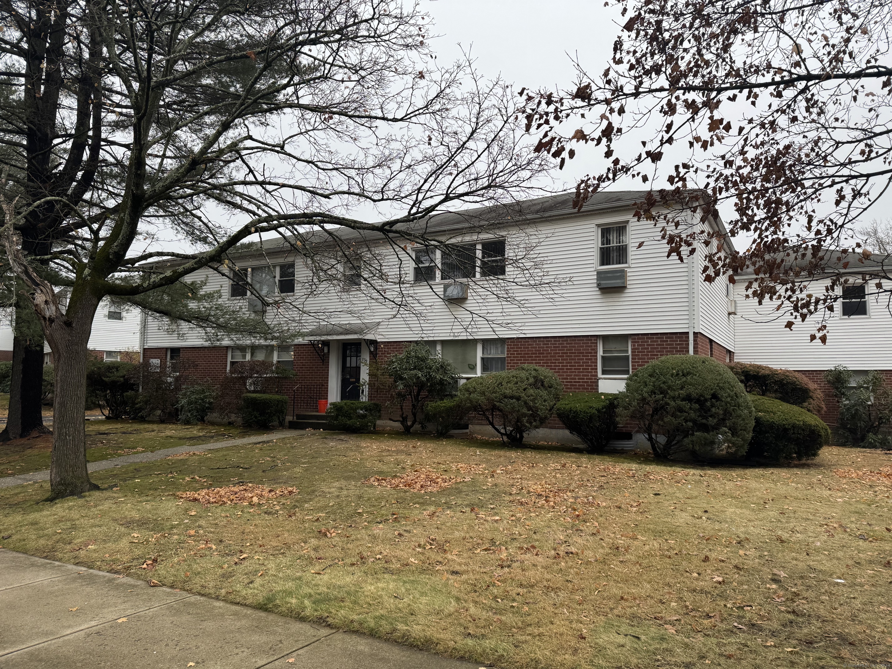 a front view of house with yard