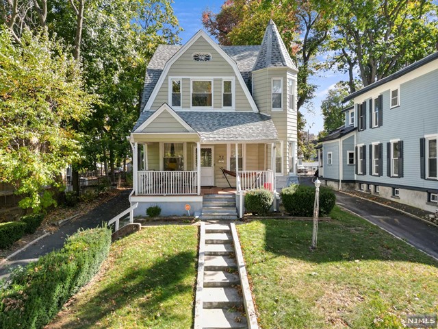 a front view of a house with yard