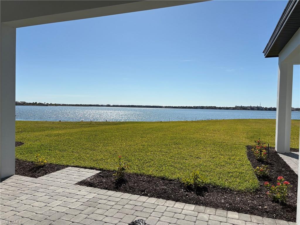 View of yard featuring a water view