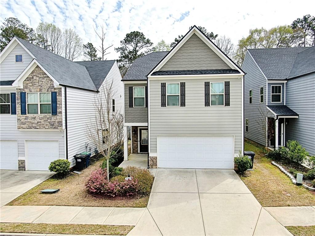 a view of house with outdoor space