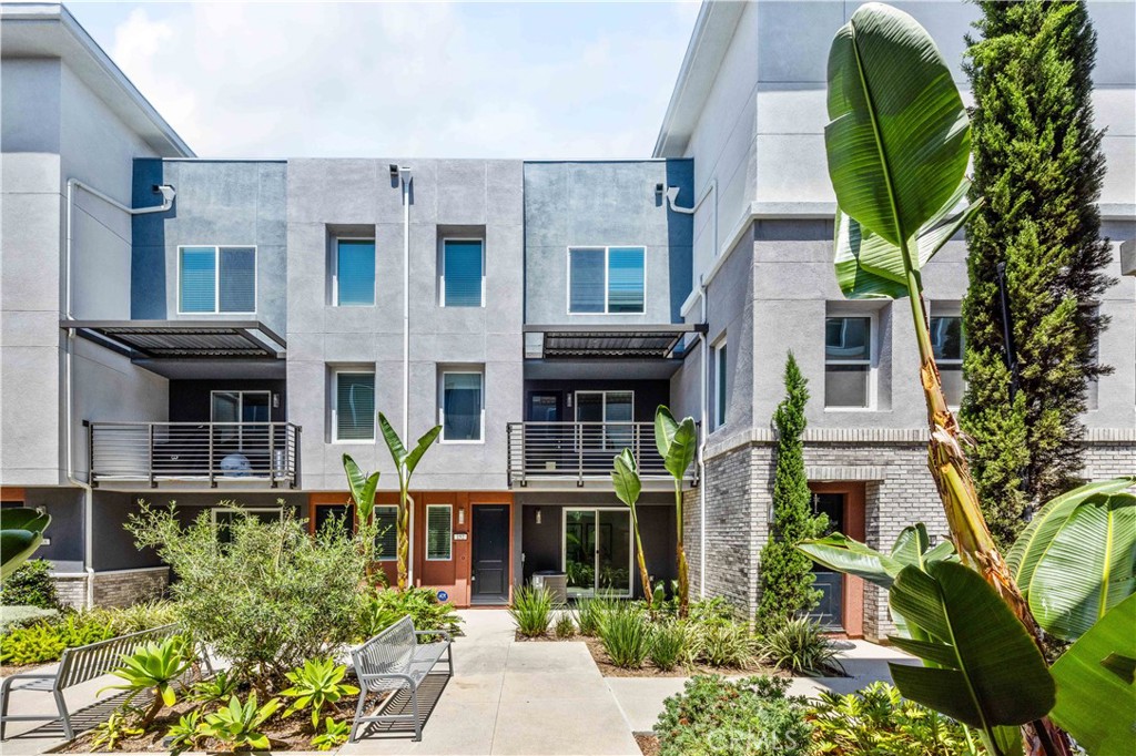 a front view of a multi story residential apartment building