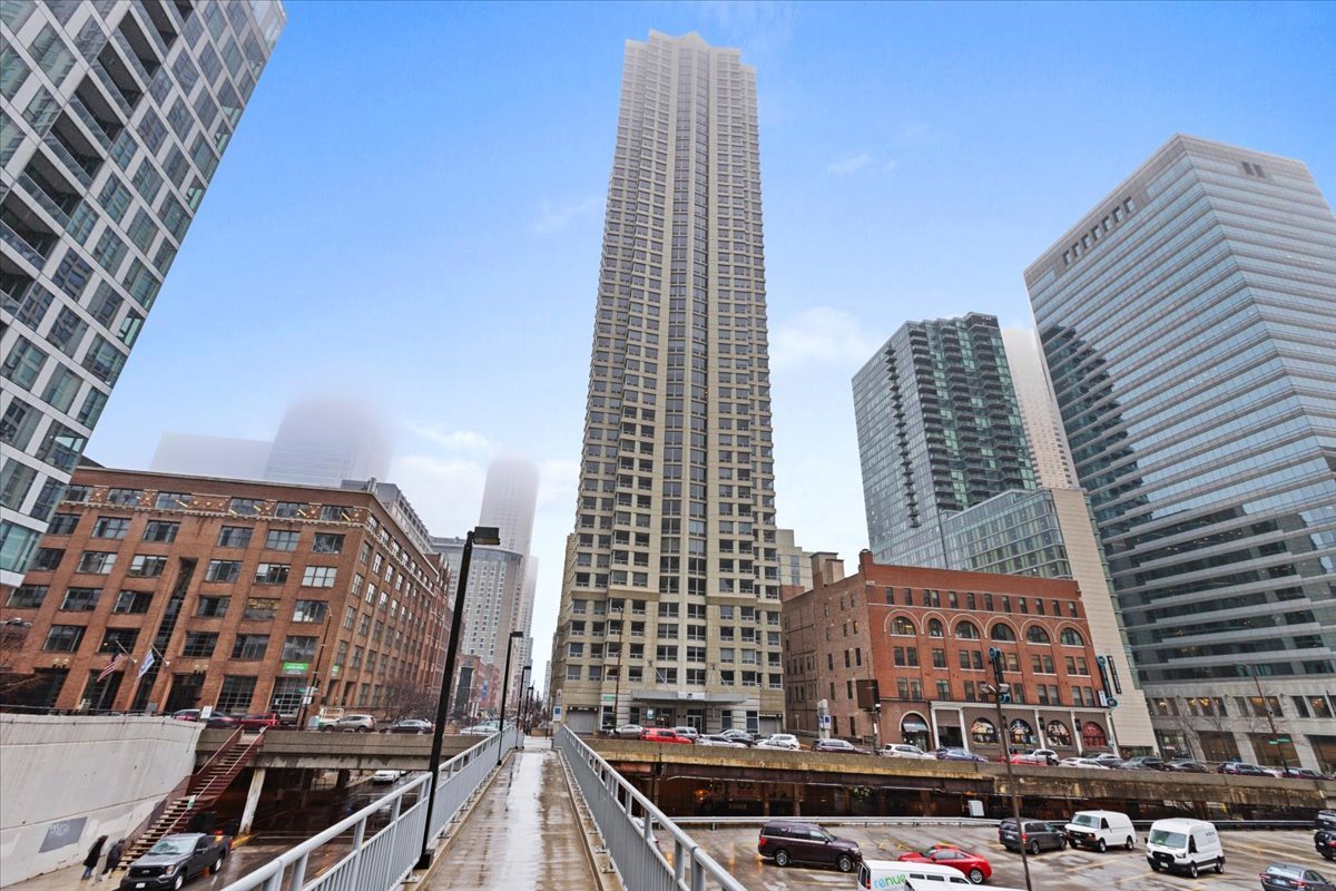 a view of a city with tall buildings