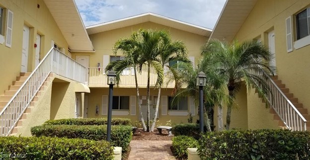 a front view of a house having yard