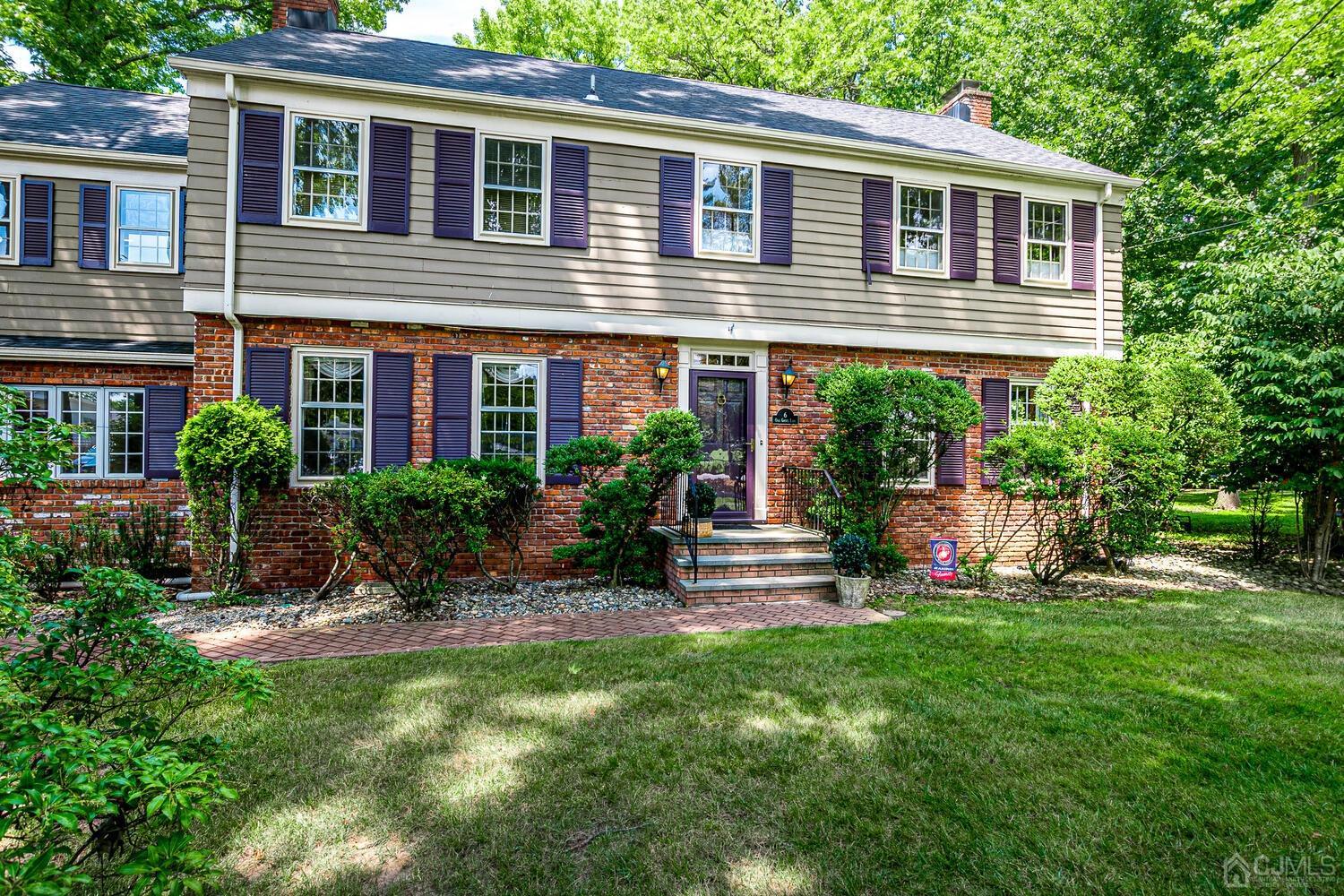 a house view with a garden space