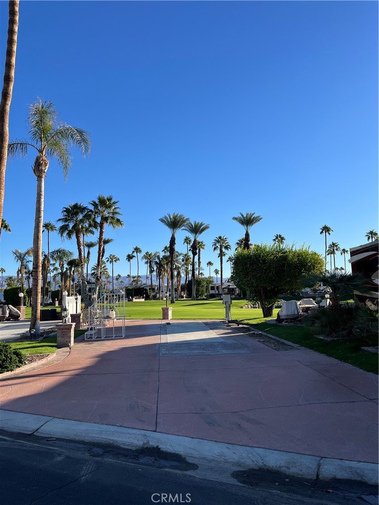 a view of a park with swings and slides