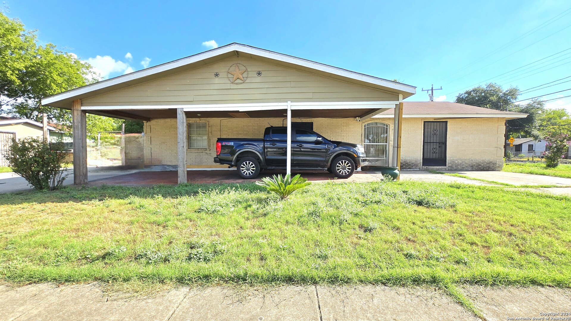 a view of a house with a patio