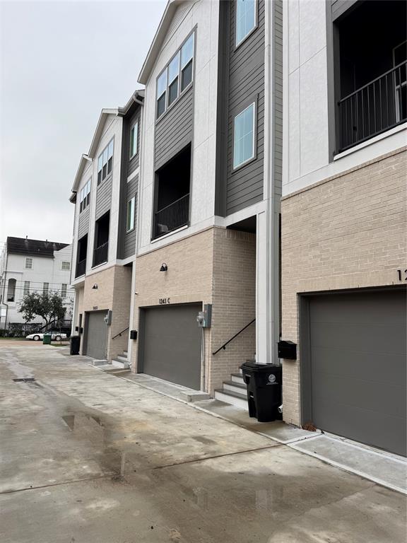 a view of a building with a parking space