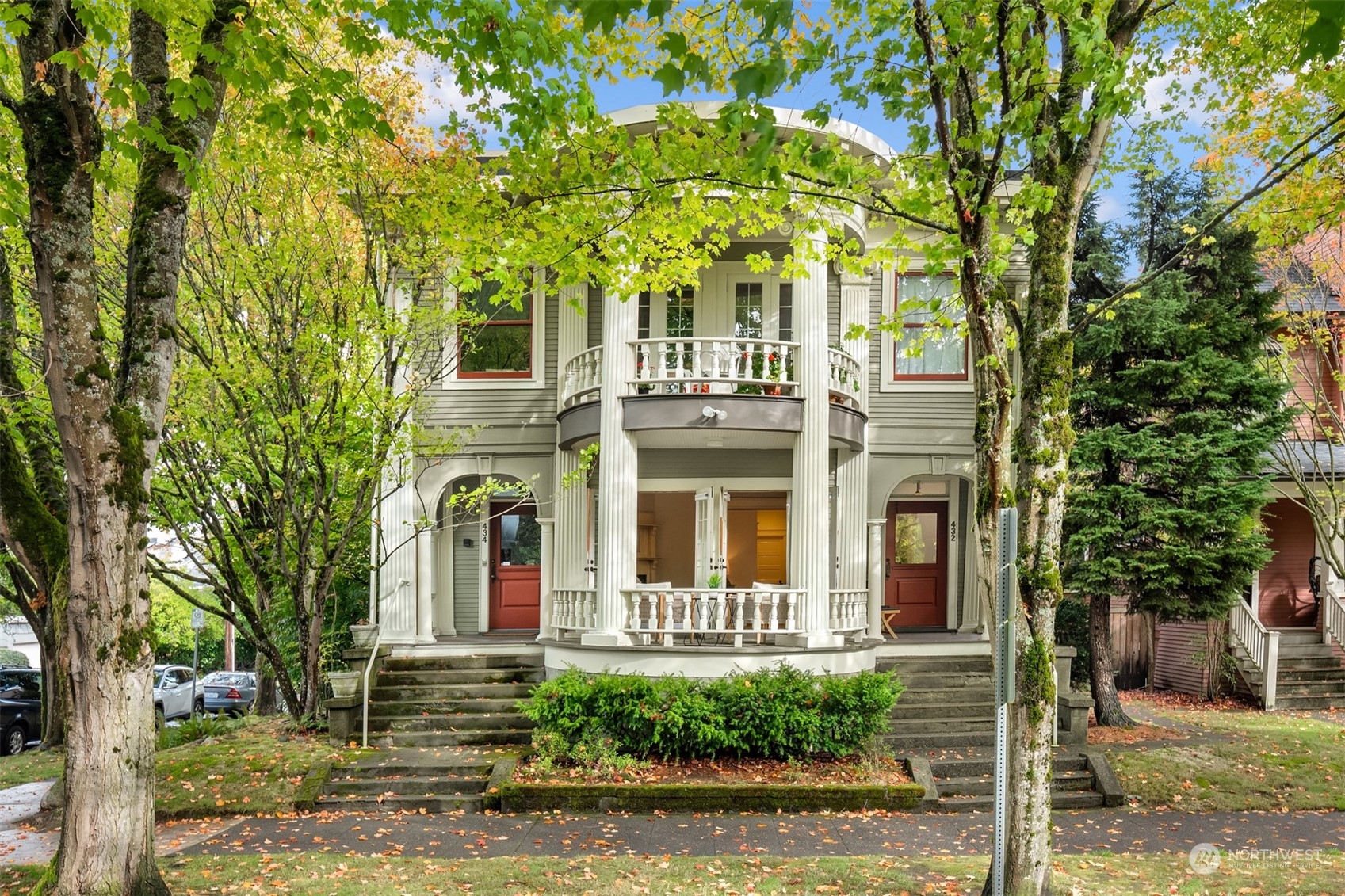 a front view of a house with garden