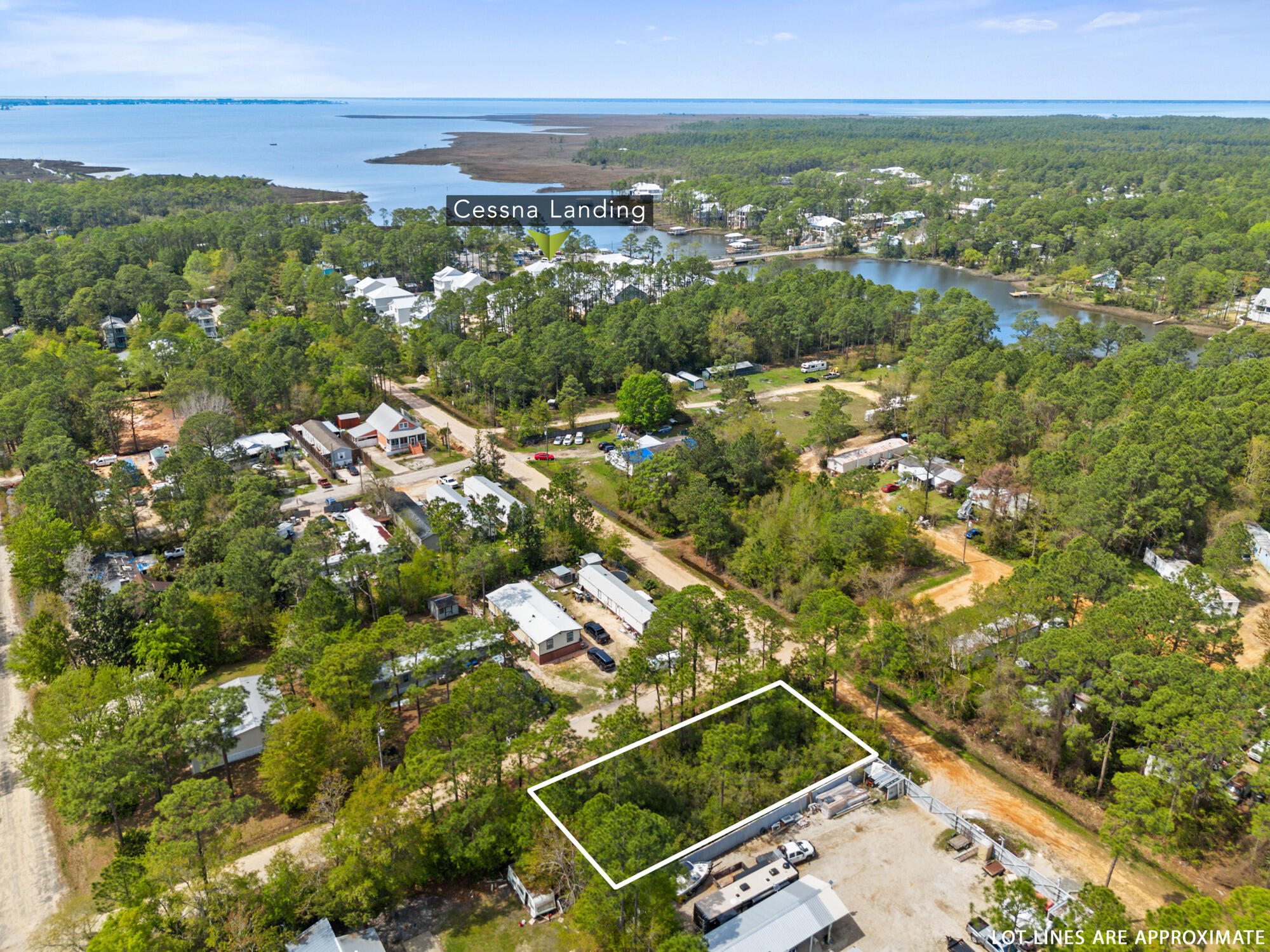 an aerial view of residential houses with city view