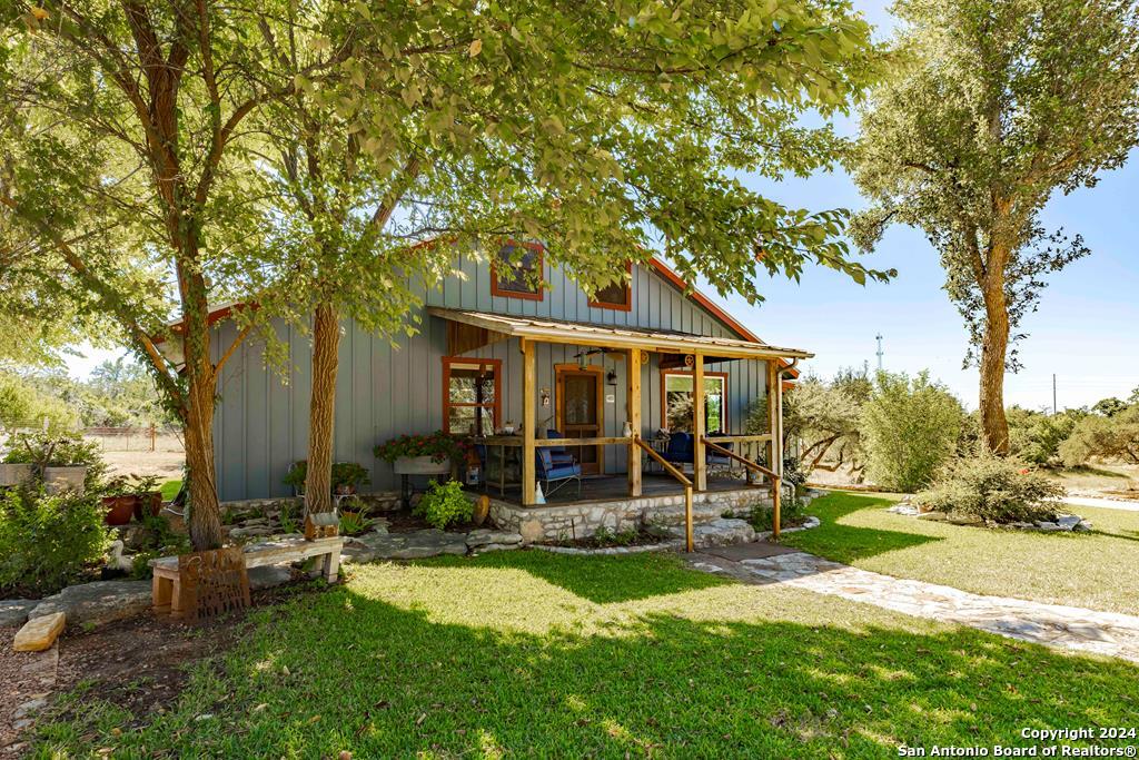 front view of a house with a yard