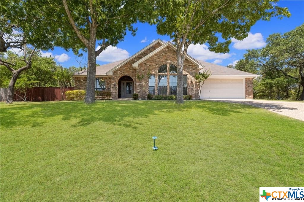 a house view with a garden space