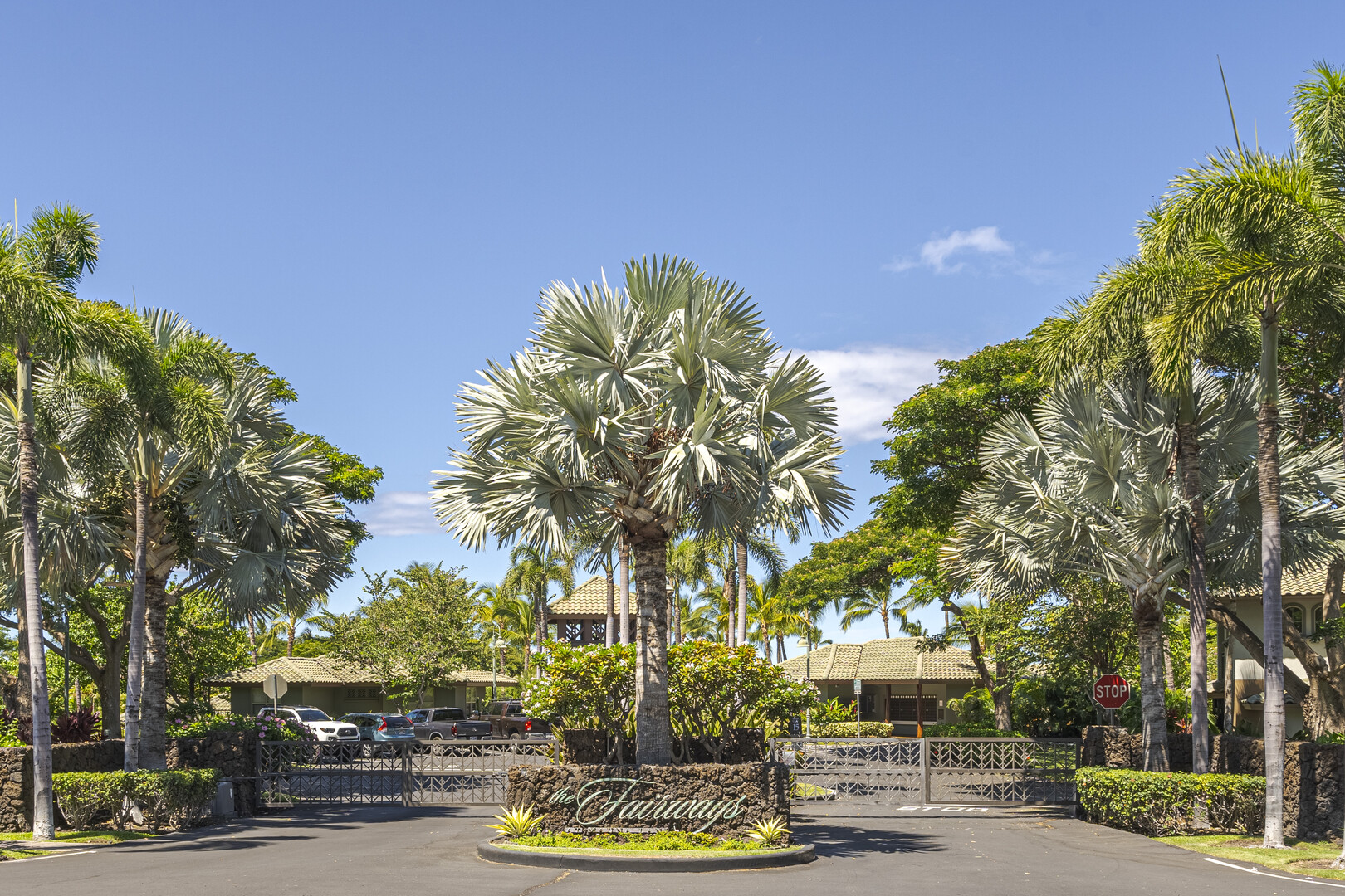 a front view of a building with tree s