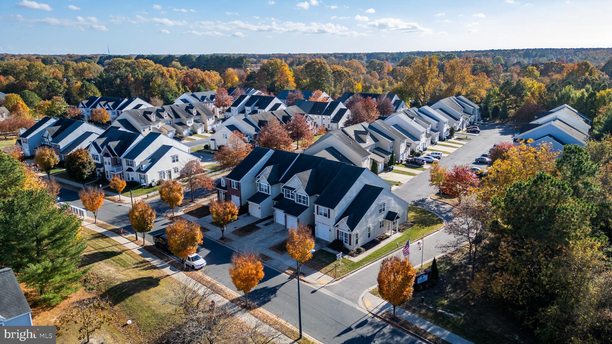 an aerial view of a house with outdoor space