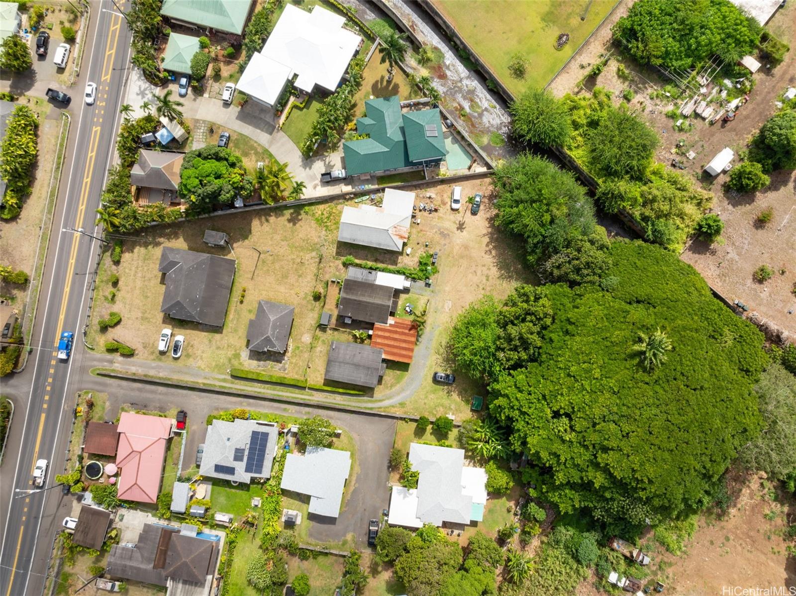 an aerial view of a houses with outdoor space