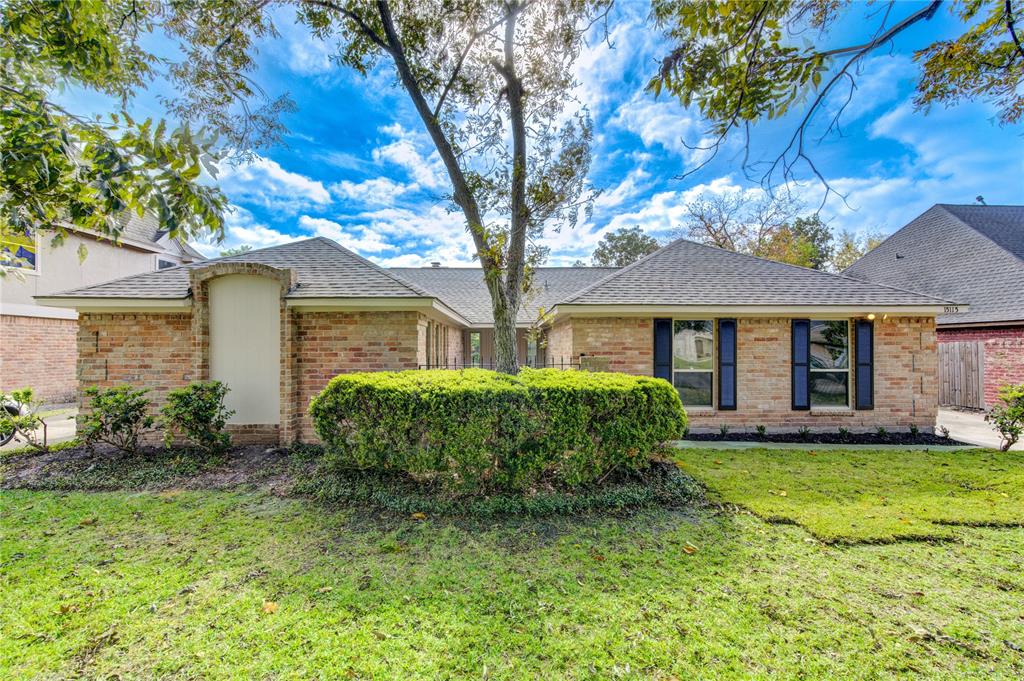 Welcome HOME! This charming brick home features a well-maintained front lawn with mature trees and shrubbery. It has a classic design with a new roof and new large windows, offering ample natural light. The property exudes a welcoming and cozy atmosphere.