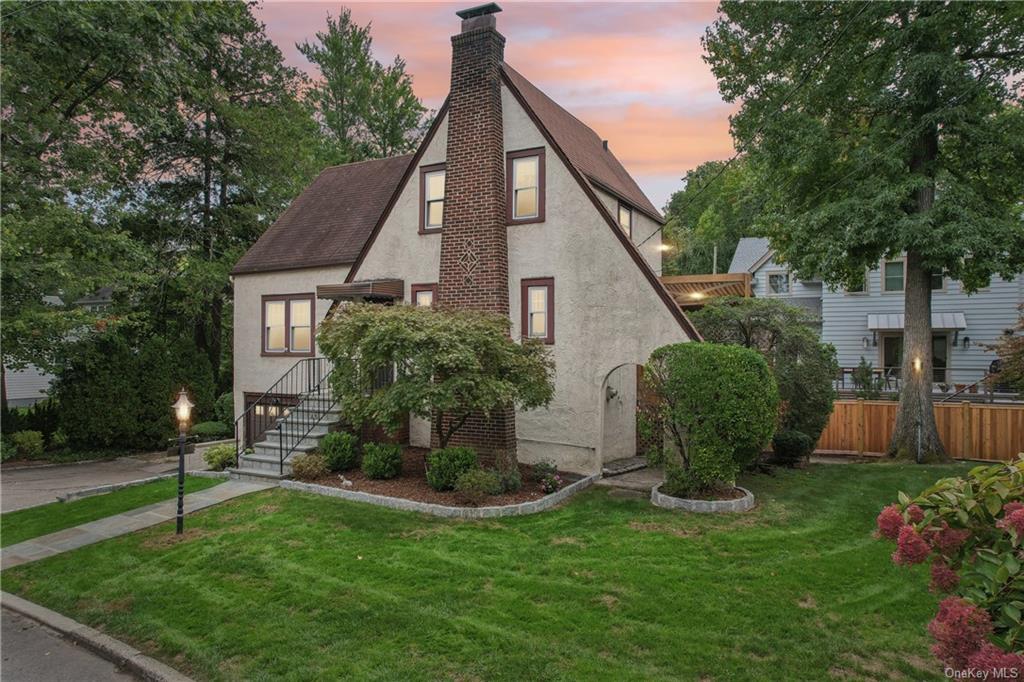 Tudor house with a lawn